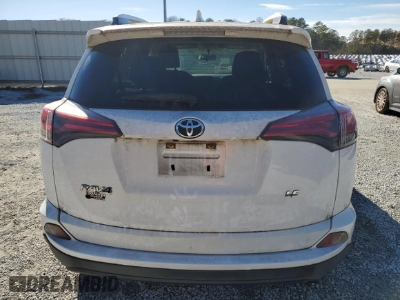 2016 Toyota RAV4 LE with VIN JTMZFREV2GJ077312, listed as a Copart auction lot 88358125 with 126,428 mi miles and Salvage Title. Bid and sale history available at carsss.com. Image 6.