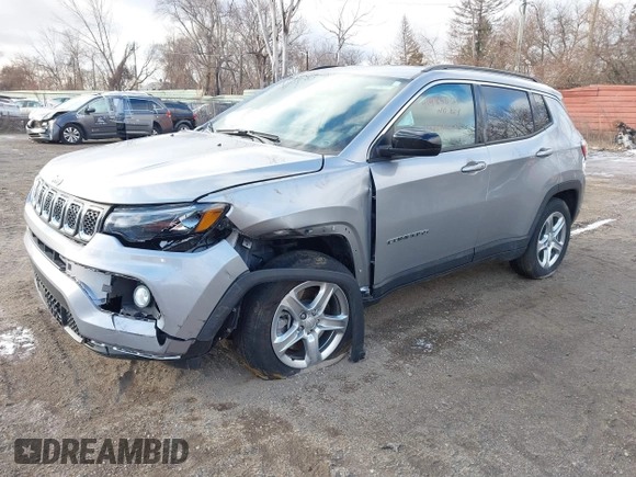 2023 Jeep Compass Latitude with VIN 3C4NJDBN7PT532099, listed as a IAAI auction lot 41485624 with 10,564 mi miles and . Bid and sale history available at DreamBid. Image 2.