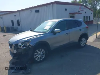 2014 Mazda CX-5 Touring with VIN JM3KE2CY9E0310315, listed as a IAAI auction lot 41943991 with 98,359 mi miles and . Bid and sale history available at carsss.com. Image 17.