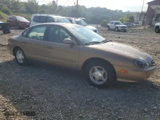 1999 Ford Taurus SE with VIN 1FAFP53U3XG292185, listed as a Copart auction lot 69292984 with 54,965 mi miles and Clean Title. Bid and sale history available at carsss.com. Image 4.