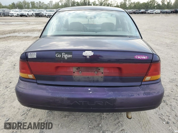 1996 Saturn SL with VIN 1G8ZK5278TZ255742, listed as a Copart auction lot 79050024 with 83,205 mi miles and Salvage title. Bid and sale history available at DreamBid. Image 6.