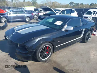 2006 Ford Mustang GT Deluxe with VIN 1ZVFT82H365148851, listed as a IAAI auction lot 41879208 with 150,095 mi miles. Bid and sale history available at carsss.com. Image 2.