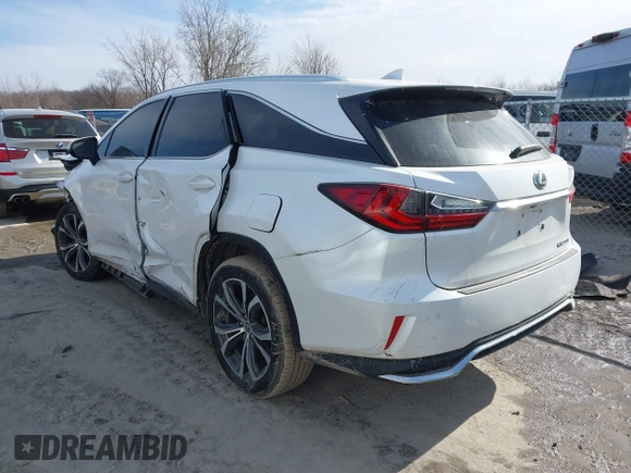 2018 Lexus RX 350L Premium z VIN JTJDZKCAXJ2005488, wystawiony jako IAAI lot #41509043 z przebiegiem 151 814 mil mil oraz . Historia ofert i sprzedaży dostępna na DreamBid. Obrazek 3.