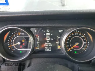2020 Jeep Wrangler Unlimited Sahara Altitude with VIN 1C4HJXEG2LW206453, listed as a Copart auction lot 82303434 with 51,559 mi miles and Salvage title. Bid and sale history available at DreamBid. Image 9.