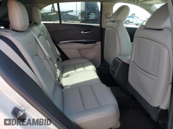 2023 Cadillac XT4 FWD Luxury with VIN 1GYAZAR46PF134602, listed as a Copart auction lot 54684865 with 13,221 mi miles and Salvage title. Bid and sale history available at DreamBid. Image 11.