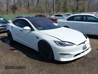 2023 Tesla Model S Plaid with VIN 5YJSA1E60PF518405, listed as a IAAI auction lot 41744237 with Not provided miles and . Bid and sale history available at DreamBid. Image 1.