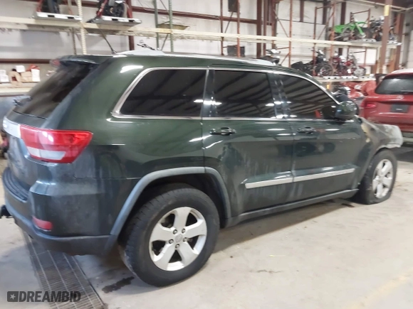 2011 Jeep Grand Cherokee Laredo with VIN 1J4RR4GTXBC545672, listed as a IAAI auction lot 41459138 with 1 mi miles. Bid and sale history available at carsss.com. Image 4.
