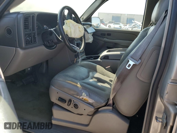 2004 Chevrolet Tahoe LT with VIN 1GNEC13ZX4R306385, listed as a Copart auction lot 75694864 with 168,142 mi miles and Salvage Title. Bid and sale history available at carsss.com. Image 7.