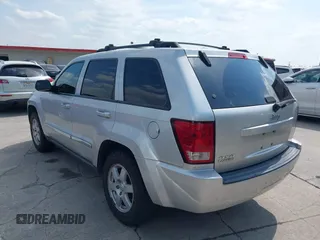 2010 Jeep Grand Cherokee Laredo with VIN 1J4PR4GK1AC143780, listed as a IAAI auction lot 42058575 with 88,608 mi miles. Bid and sale history available at carsss.com. Image 3.