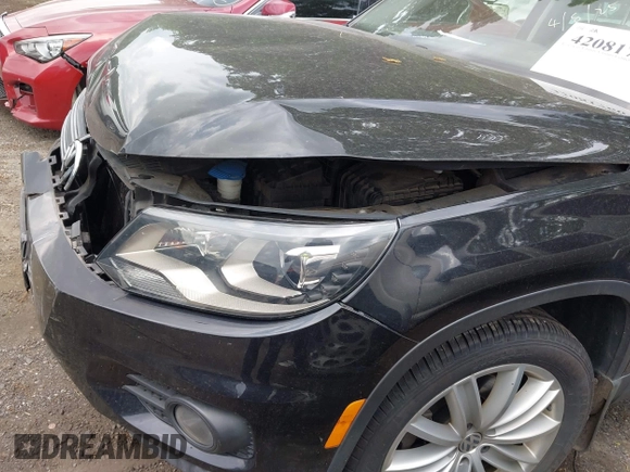 2016 Volkswagen Tiguan S with VIN WVGBV7AX6GW542656, listed as a IAAI auction lot 42081760 with 85,200 mi miles and . Bid and sale history available at DreamBid. Image 17.