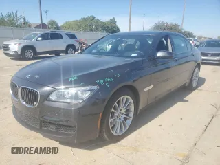 2014 BMW 7 Series 740Li with VIN WBAYE4C59ED138376, listed as a Copart auction lot 76878354 with 73,129 mi miles and Salvage Title. Bid and sale history available at carsss.com. Image 1.