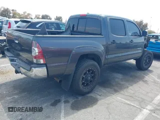 2010 Toyota Tacoma PreRunner with VIN 3TMJU4GN9AM097599, listed as a IAAI auction lot 42153344 with 213,063 mi miles and . Bid and sale history available at DreamBid. Image 4.