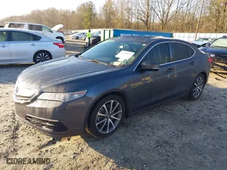 2015 Acura TLX V6 with VIN 19UUB2F32FA021168, listed as a IAAI auction lot 41738695 with 104,525 mi miles. Bid and sale history available at carsss.com. Image 17.