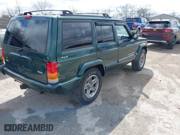 2000 Jeep Cherokee Classic with VIN 1J4FF58S3YL258755, listed as a IAAI auction lot 42020260 with 228,867 mi miles. Bid and sale history available at carsss.com. Image 4.