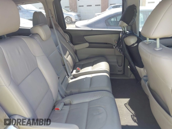 2012 Honda Odyssey Touring with VIN 5FNRL5H92CB108690, listed as a IAAI auction lot 41826580 with 150,327 mi miles and . Bid and sale history available at DreamBid. Image 8.