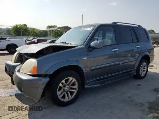 2004 Suzuki XL7 LX z VIN JS3TX92V844109991, wystawiony jako Copart lot #58934415 z przebiegiem 205 951 mil mil oraz Szkoda całkowita • Salvage title. Historia ofert i sprzedaży dostępna na DreamBid. Obrazek 1.