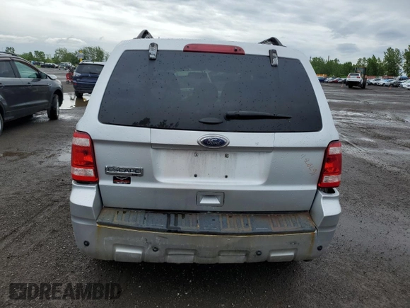 2010 Ford Escape Limited with VIN 1FMCU9EG3AKC97990, listed as a Copart auction lot 61552055 with 278,447 mi miles and Salvage title. Bid and sale history available at DreamBid. Image 6.
