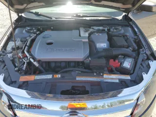 2012 Ford Fusion Hybrid with VIN 3FADP0L3XCR315255, listed as a Copart auction lot 59548955 with 118,412 mi miles and Salvage title. Bid and sale history available at DreamBid. Image 11.