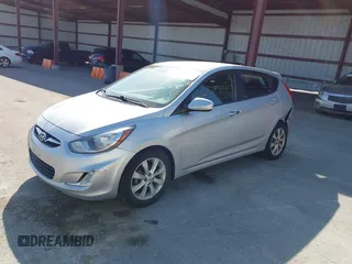 2012 Hyundai Accent SE with VIN KMHCU5AE0CU021092, listed as a IAAI auction lot 41789027 with 137,557 mi miles. Bid and sale history available at carsss.com. Image 2.