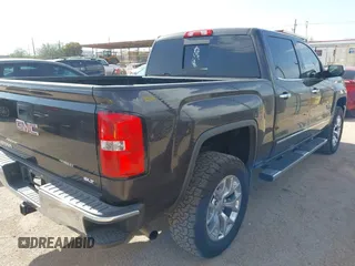 2014 GMC Sierra 1500 SLT with VIN 3GTP1VEC4EG132046, listed as a IAAI auction lot 42677146 with 204,749 mi miles and . Bid and sale history available at DreamBid. Image 4.