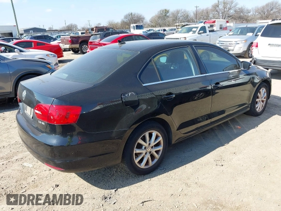 2013 Volkswagen Jetta SE z VIN 3VWDX7AJ2DM438211, wystawiony jako IAAI lot #41500230 z przebiegiem 176 525 mil mil oraz . Historia ofert i sprzedaży dostępna na DreamBid. Obrazek 4.