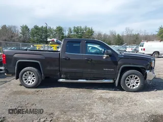2018 GMC Sierra 1500 SLE z VIN 1GTV2MEC3JZ143967, wystawiony jako IAAI lot #41853850 z przebiegiem 80 205 mil mil oraz . Historia ofert i sprzedaży dostępna na DreamBid. Obrazek 13.