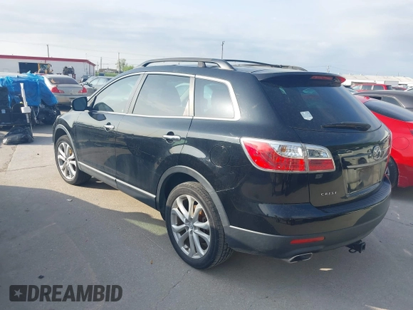 2012 Mazda CX-9 Grand Touring with VIN JM3TB2DA4C0343878, listed as a IAAI auction lot 41921590 with 168,927 mi miles and . Bid and sale history available at DreamBid. Image 3.