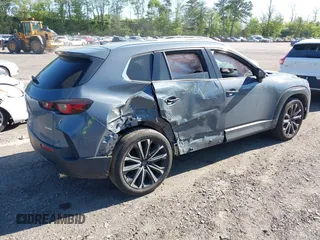 2023 Mazda CX-50 S Premium Plus with VIN 7MMVABEM8PN108020, listed as a IAAI auction lot 42203568 with 26,783 mi miles and . Bid and sale history available at DreamBid. Image 6.