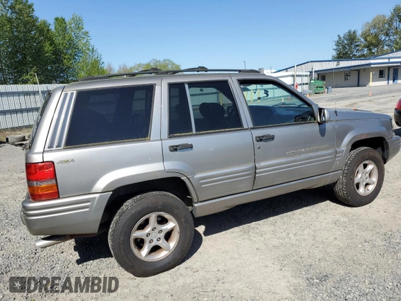 1998 Jeep Grand Cherokee Limited z VIN 1J4GZ88Z1WC231772, wystawiony jako Copart lot #55697775 z przebiegiem 178 896 mil mil oraz Czysty tytuł • Clean title. Historia ofert i sprzedaży dostępna na DreamBid. Obrazek 3.