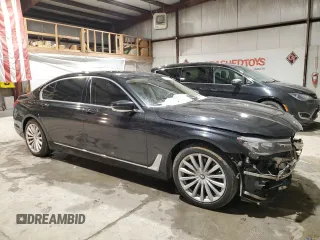 2017 BMW 7 Series 740i with VIN WBA7E2C3XHG741046, listed as a Copart auction lot 45382705 with 99,065 mi miles and Salvage Title. Bid and sale history available at carsss.com. Image 4.