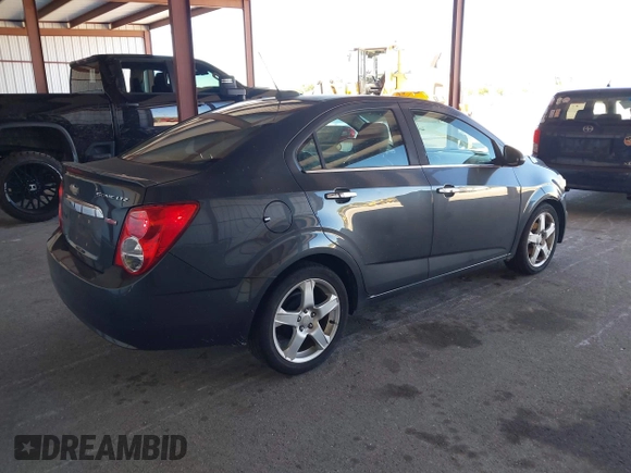 2016 Chevrolet Sonic LTZ z VIN 1G1JE5SB6G4160588, wystawiony jako IAAI lot #41843199 z przebiegiem 176 581 mil mil oraz . Historia ofert i sprzedaży dostępna na DreamBid. Obrazek 4.