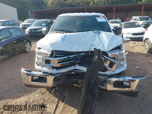 2018 Ford F-150 XL with VIN 1FTEW1E55JKF29898, listed as a IAAI auction lot 40593129 with 158,663 mi miles and . Bid and sale history available at carsss.com. Image 12.