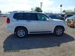 2007 Lexus GX 470 z VIN JTJBT20X670139209, wystawiony jako IAAI lot #42282717 z przebiegiem 305 114 mil mil oraz . Historia ofert i sprzedaży dostępna na DreamBid. Obrazek 13.