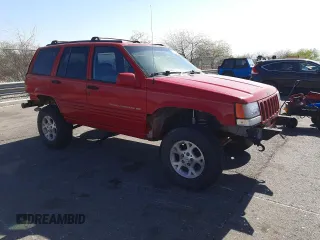 1996 Jeep Grand Cherokee Limited with VIN 1J4GZ78Y0TC376265, listed as a Copart auction lot 52124345 with 205,676 mi miles and Salvage Title. Bid and sale history available at carsss.com. Image 4.