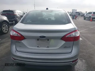 2017 Ford Fiesta SE with VIN 3FADP4BJXHM116900, listed as a IAAI auction lot 41815656 with 74,662 mi miles and . Bid and sale history available at DreamBid. Image 17.