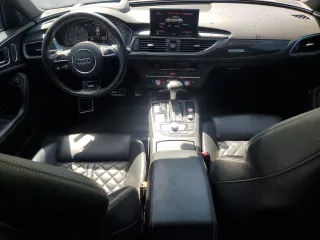2014 Audi S6 Prestige z VIN WAUF2AFC9EN133262, wystawiony jako Copart lot #48524255 z przebiegiem 120 103 mil mil oraz Tytuł czysty. Historia ofert i sprzedaży dostępna na DreamBid. Obrazek 8.