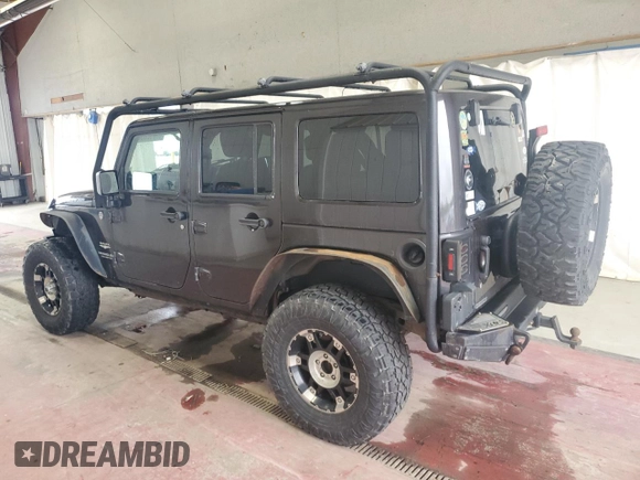 2013 Jeep Wrangler Unlimited Sahara with VIN 1C4HJWEG0DL658138, listed as a Copart auction lot 63792855 with Not provided miles and Clean title. Bid and sale history available at DreamBid. Image 2.