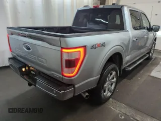 2022 Ford F-150 XL with VIN 1FTFW1E85NKE47335, listed as a IAAI auction lot 41950573 with 10,026 mi miles. Bid and sale history available at carsss.com. Image 1.