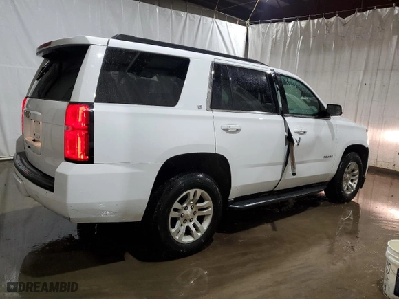 2019 Chevrolet Tahoe LT with VIN 1GNSKBKC3KR307481, listed as a Copart auction lot 82666844 with 106,309 mi miles and Salvage Title. Bid and sale history available at carsss.com. Image 3.