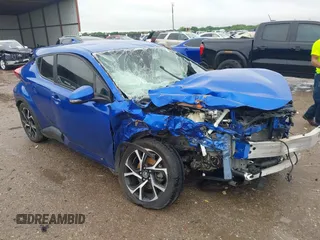 2018 Toyota C-HR XLE z VIN NMTKHMBX0JR038764, wystawiony jako IAAI lot #42148368 z przebiegiem Nie podano mil oraz . Historia ofert i sprzedaży dostępna na DreamBid. Obrazek 1.