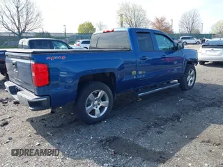 2015 Chevrolet Silverado 1500 LT with VIN 1GCVKREH4FZ198461, listed as a IAAI auction lot 42026231 with 116,075 mi miles. Bid and sale history available at carsss.com. Image 4.