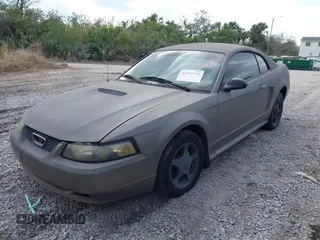 2001 Ford Mustang Standard z VIN 1FAFP40461F182730, wystawiony jako IAAI lot #41597721 z przebiegiem 160 132 mil mil oraz . Historia ofert i sprzedaży dostępna na DreamBid. Obrazek 2.