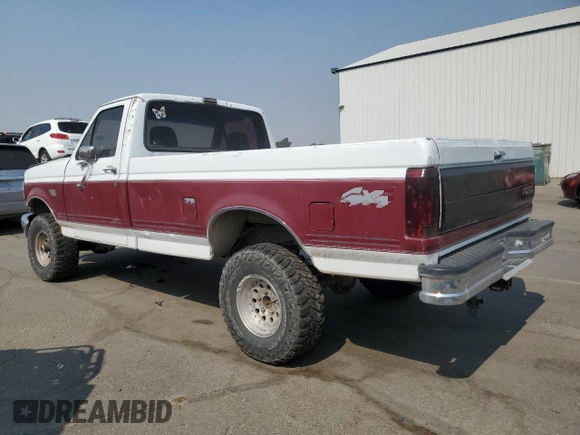 1992 Ford F-150 with VIN 1FTEF14HXNPA24587, listed as a Copart auction lot 70803324 with 0 mi miles and Salvage Title. Bid and sale history available at carsss.com. Image 2.