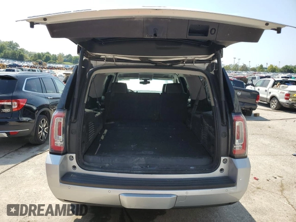 2015 GMC Yukon XL SLE with VIN 1GKS2GKC4FR678777, listed as a Copart auction lot 68642194 with 151,909 mi miles and Salvage Title. Bid and sale history available at carsss.com. Image 6.