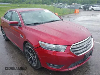 2014 Ford Taurus SEL z VIN 1FAHP2E83EG125622, wystawiony jako IAAI lot #42204238 z przebiegiem 134 032 mil mil oraz . Historia ofert i sprzedaży dostępna na DreamBid. Obrazek 1.