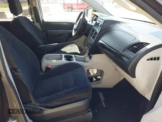 2015 Dodge Grand Caravan SXT with VIN 2C4RDGCG1FR556846, listed as a IAAI auction lot 42179172 with 120,170 mi miles and . Bid and sale history available at DreamBid. Image 5.