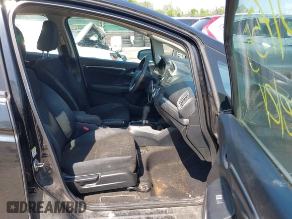 2015 Honda Fit LX z VIN 3HGGK5H51FM724566, wystawiony jako IAAI lot #42151755 z przebiegiem 168 744 mil mil oraz . Historia ofert i sprzedaży dostępna na DreamBid. Obrazek 5.