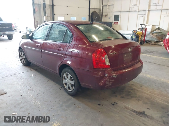 2007 Hyundai Accent GLS with VIN KMHCN46C27U111106, listed as a IAAI auction lot 41383317 with 147,882 mi miles. Bid and sale history available at carsss.com. Image 3.