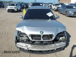 2002 BMW 3 Series 325i with VIN WBAEV33412KL55500, listed as a IAAI auction lot 42008308 with 172,852 mi miles. Bid and sale history available at carsss.com. Image 13.