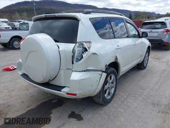 2010 Toyota RAV4 Limited with VIN JTMDF4DV3A5023063, listed as a IAAI auction lot 41983738 with 163,059 mi miles and . Bid and sale history available at DreamBid. Image 6.